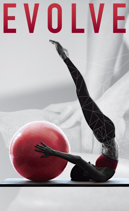 Woman exercising using a red pilates ball